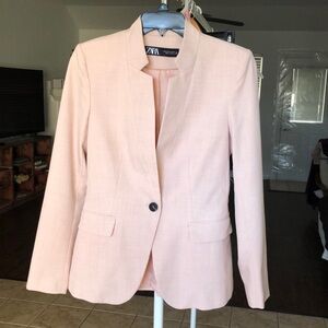Brand new ZARA blazer without tag. Size 2. Color pale pink.